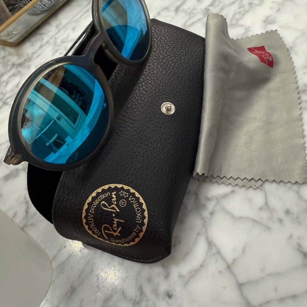 Stylish Black Sunglasses with Blue Lenses